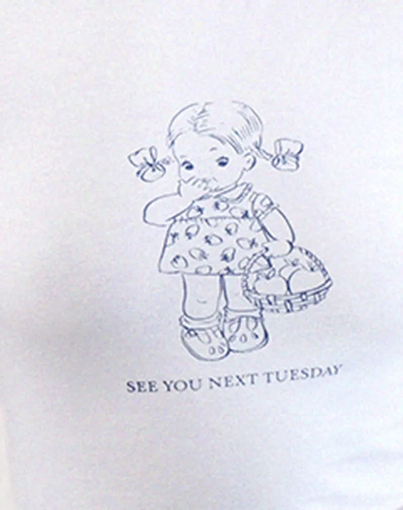 Sutin Tee in White with See You Next Tuesday Slogan